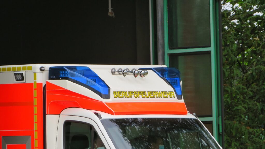 an ambulance parked in front of a building