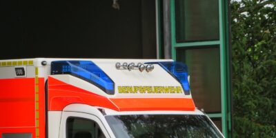 an ambulance parked in front of a building