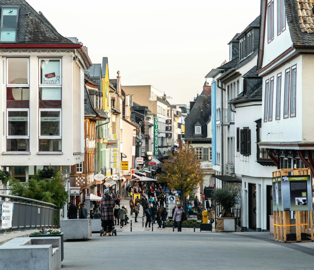 people walking on street near buildings during daytime