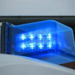 a blue light on top of a white truck, Polizei, Unfall, Einsatz